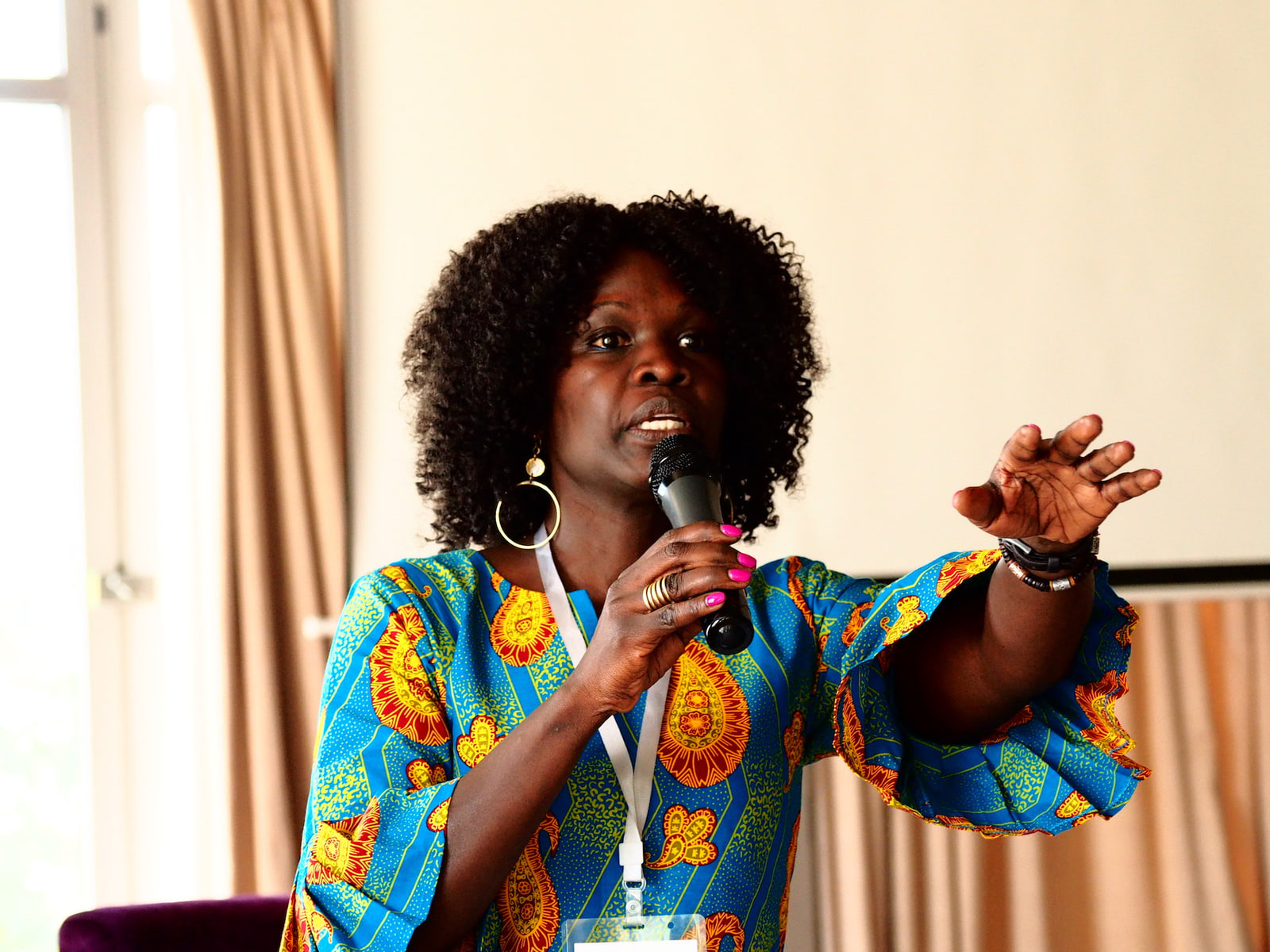 Ash speaking at a session